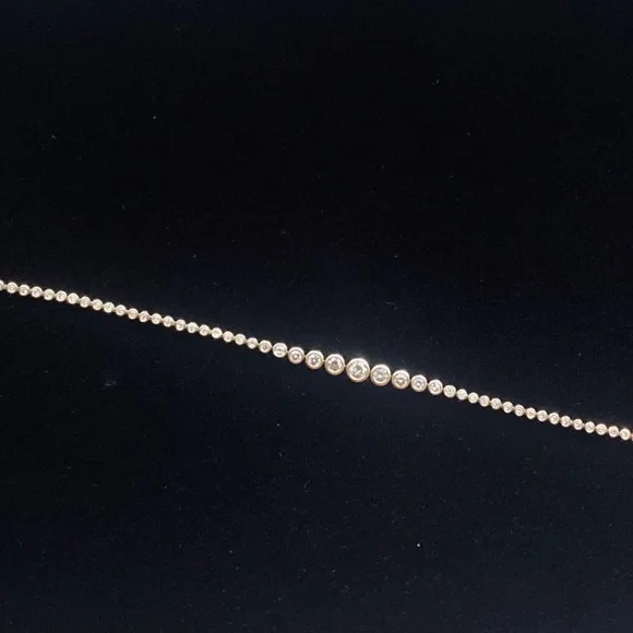 DIAMOND GRDUATING TENNIS BRACELET
